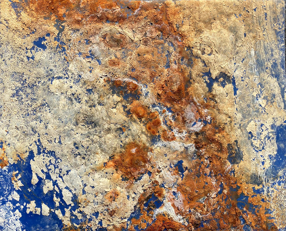 Abstract rust and calcium carbonate on blue vinal